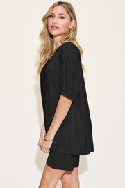 Black bamboo loungewear set with relaxed fit tee and shorts.