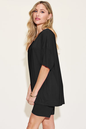 Black bamboo loungewear set with relaxed fit tee and shorts.