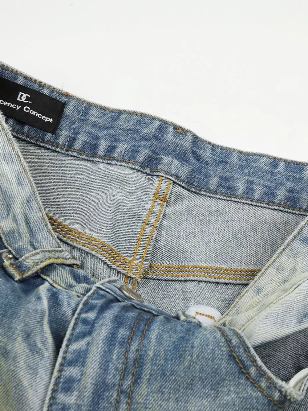 Men's blue denim jeans with wide leg and heritage-inspired wash.