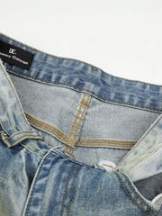 Men's blue denim jeans with wide leg and heritage-inspired wash.