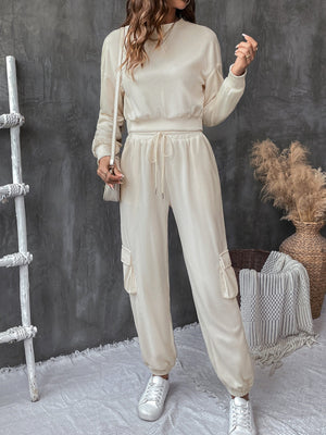 Cream ribbed knit cargo co-ord set with drawstring waist and pocket details.