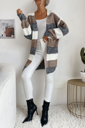 Open-front knit cardigan with horizontal stripes in khaki, black, white, and dark gray.