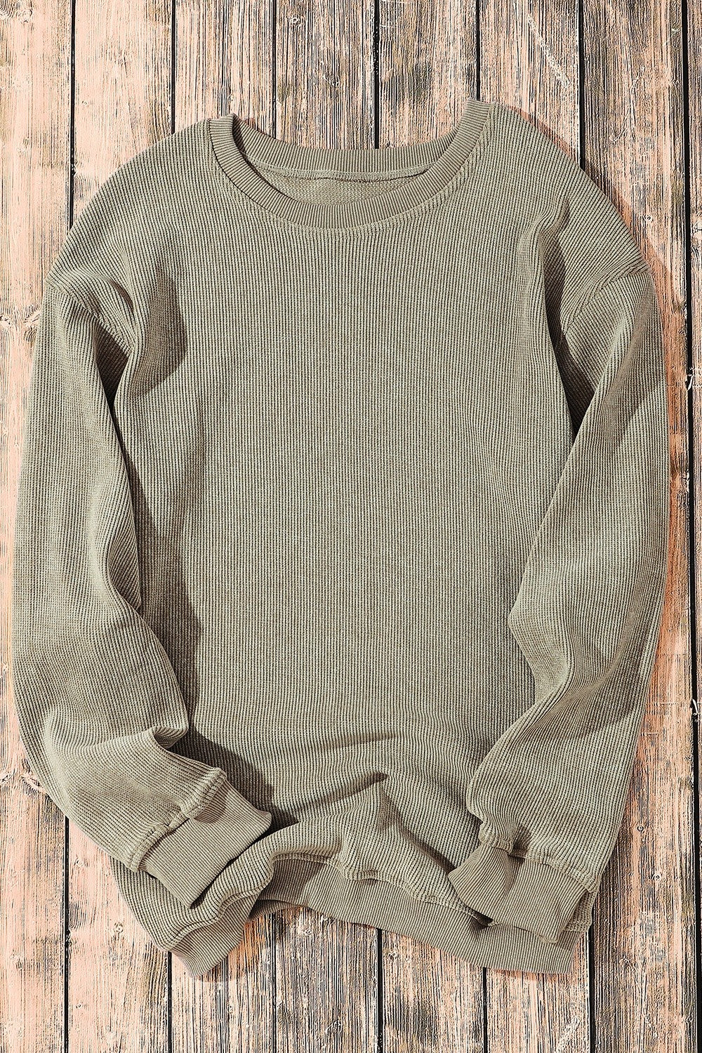 Textured ribbed crewneck pullover in Sage with long sleeves and cuffed hem.