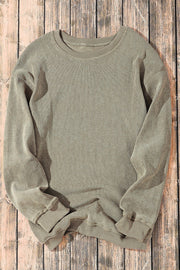 Textured ribbed crewneck pullover in Sage with long sleeves and cuffed hem.