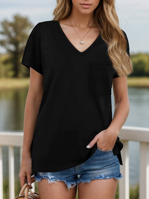Black V-neck tee with short sleeves and a chest pocket, styled with denim shorts.