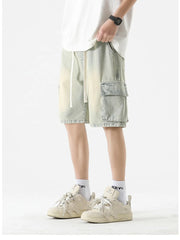 Light wash denim cargo shorts with drawstring and side pockets.