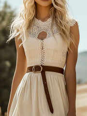 Cream lace trim cutout dress with short sleeves and a high neckline, belted with brown leather.