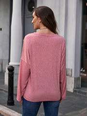 Slouchy tee in heathered pink with long sleeves and a relaxed fit.
