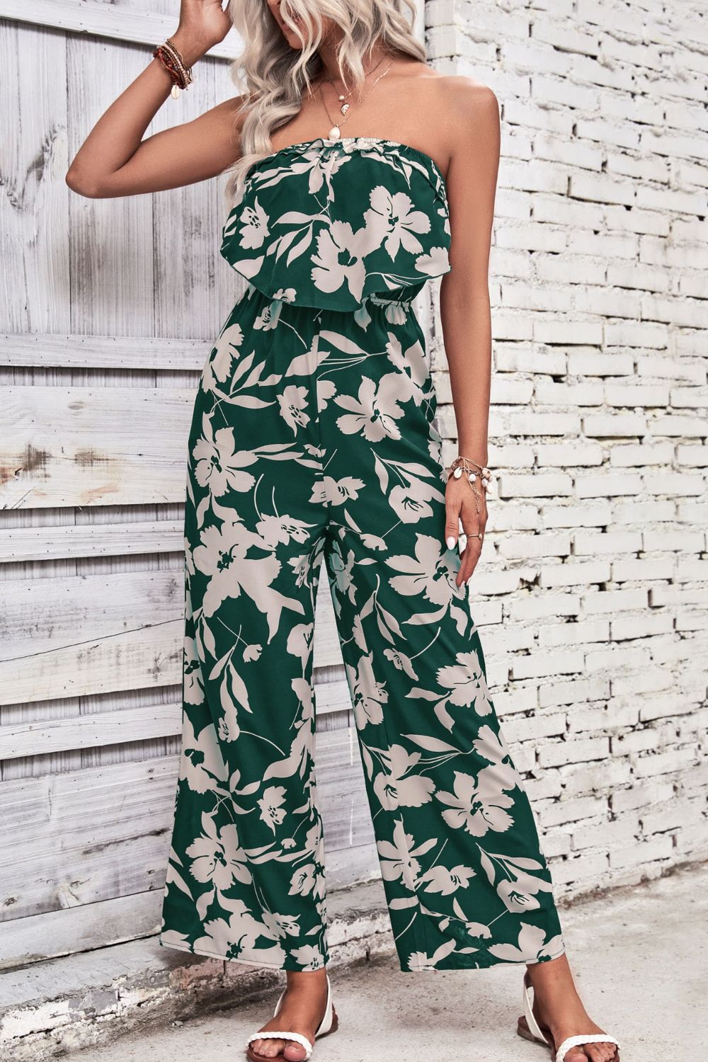 Dark green floral ruffle bandeau palazzo jumpsuit with wide legs.