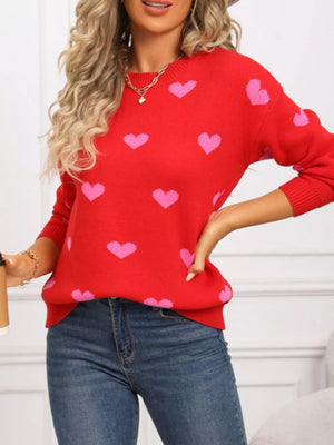 Rose red acrylic sweater with pink heart print, crew neck, and long sleeves.