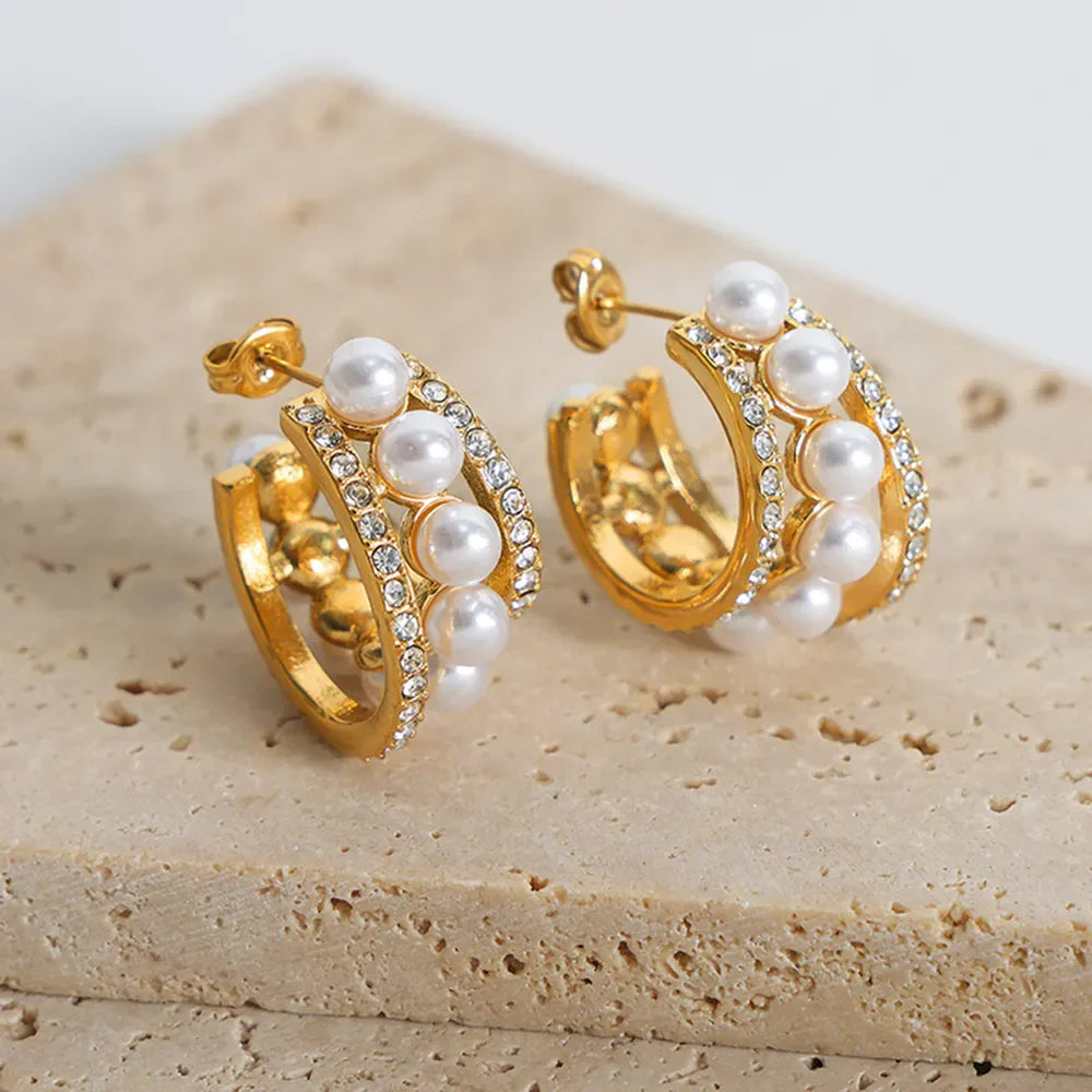 Gold double hoop earrings with pave crystals and pearls