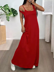Red scoop neck cami maxi dress with spaghetti straps and a flowy skirt.