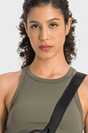 Sage green sculpted neckline crop top with black strap detail