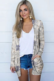 Beige open-front cardigan with a geometric paisley print and pockets