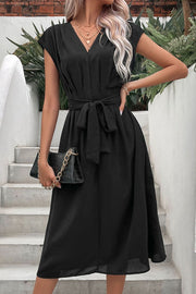 Black cap sleeve wrap midi dress with belted waist.