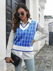 Plaid V-neck vest in Peacock Blue and white acrylic, with ribbed trim.