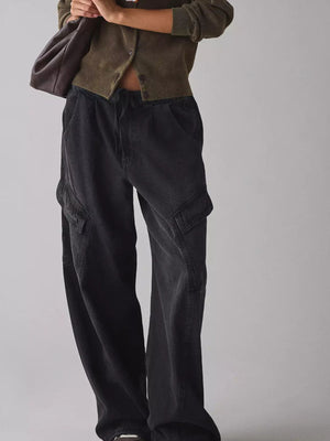 Black drawstring waist cargo jeans with utility pockets and a relaxed fit.