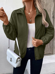 Army green nylon bomber jacket with drawstring hem and zippered front.