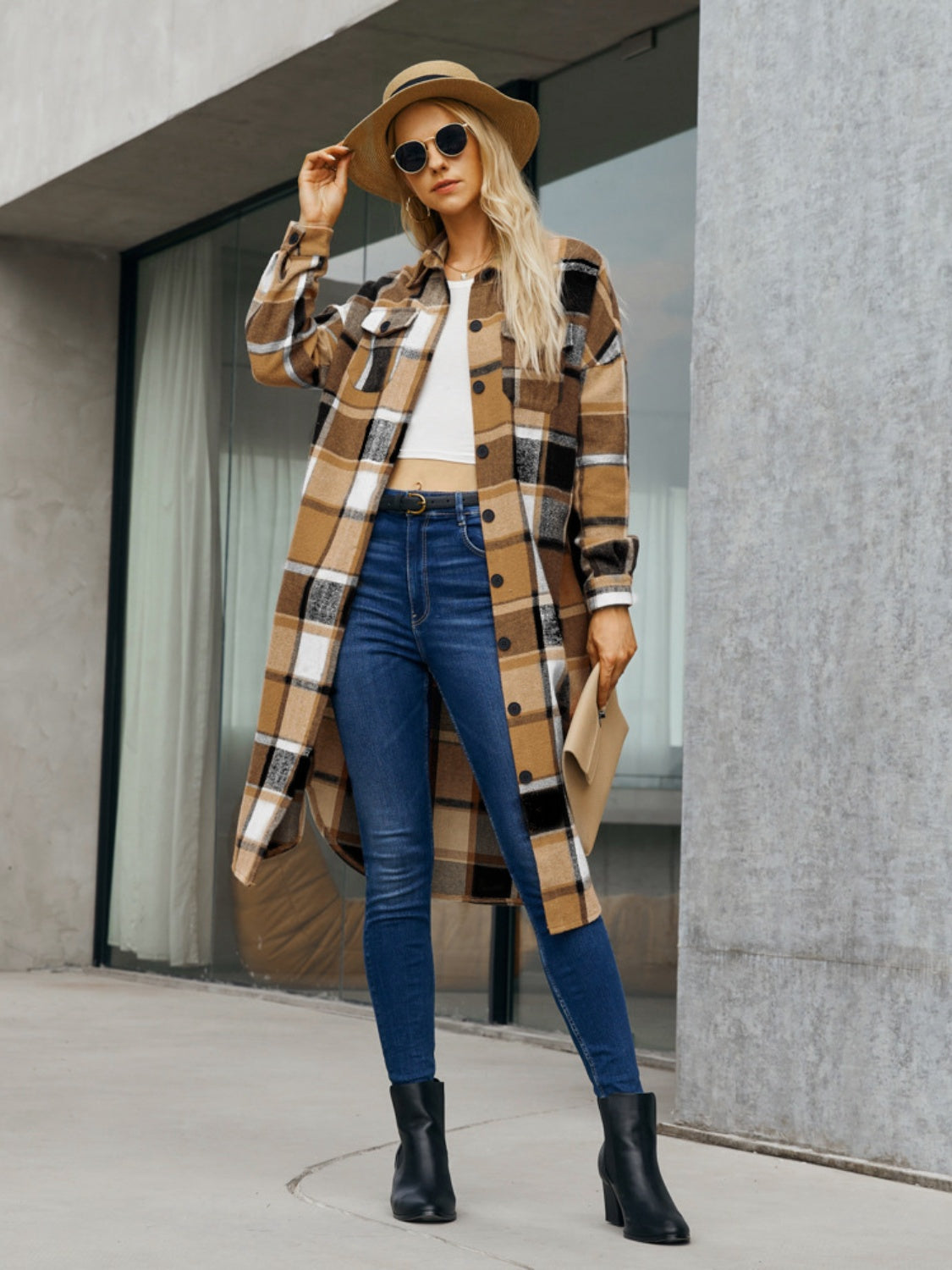 Oversized plaid shirt jacket dress in caramel with button front and pockets.