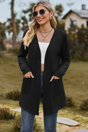 Black textured open-front cardigan with pockets and long sleeves.