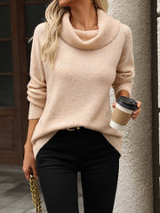 Cowl neck knit pullover sweater in apricot with long sleeves.
