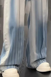 Relaxed fit ombre wide-leg jeans in blue cotton with a faded effect.