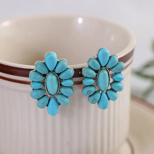 Turquoise petal stud earrings with silver alloy setting.