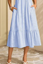 Light blue striped midi dress with pockets and tiered ruffle hem