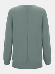 Waffle knit relaxed fit crewneck top in Gum Leaf green with a seam down the back.