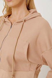 Waffle knit cropped zip hoodie in khaki with a front pocket and drawstring hood.