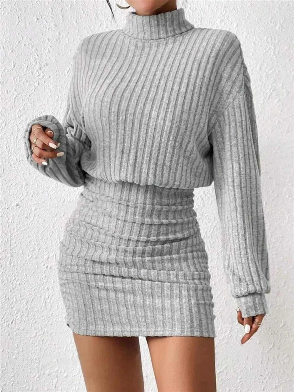 Light gray ribbed turtleneck mini dress with long sleeves and ruched detail