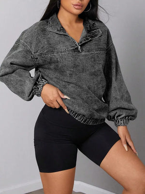 Dark gray acid wash denim quarter-zip sweatshirt with elastic hem and cuffs.