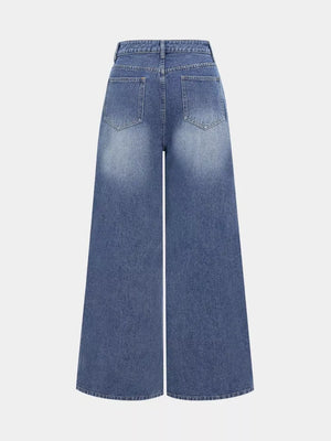 Chic high-waisted wide-leg jeans in blue denim with a faded wash and button closure.