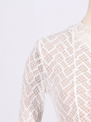 White lace maxi dress with mock neck and geometric pattern detail