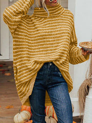 Gold striped oversized turtleneck sweater with slouch pockets and a button detail.