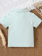 Light green striped cotton polo shirt for baby with classic collar.
