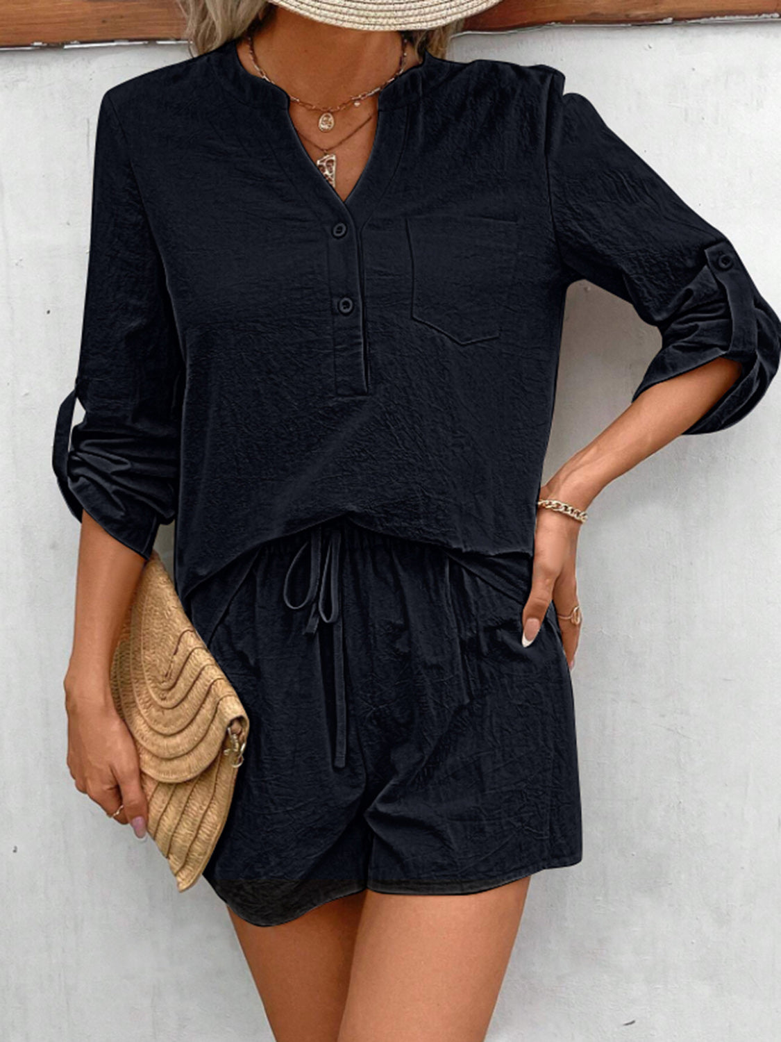 Black linen henley shirt with rolled sleeves and drawstring shorts set