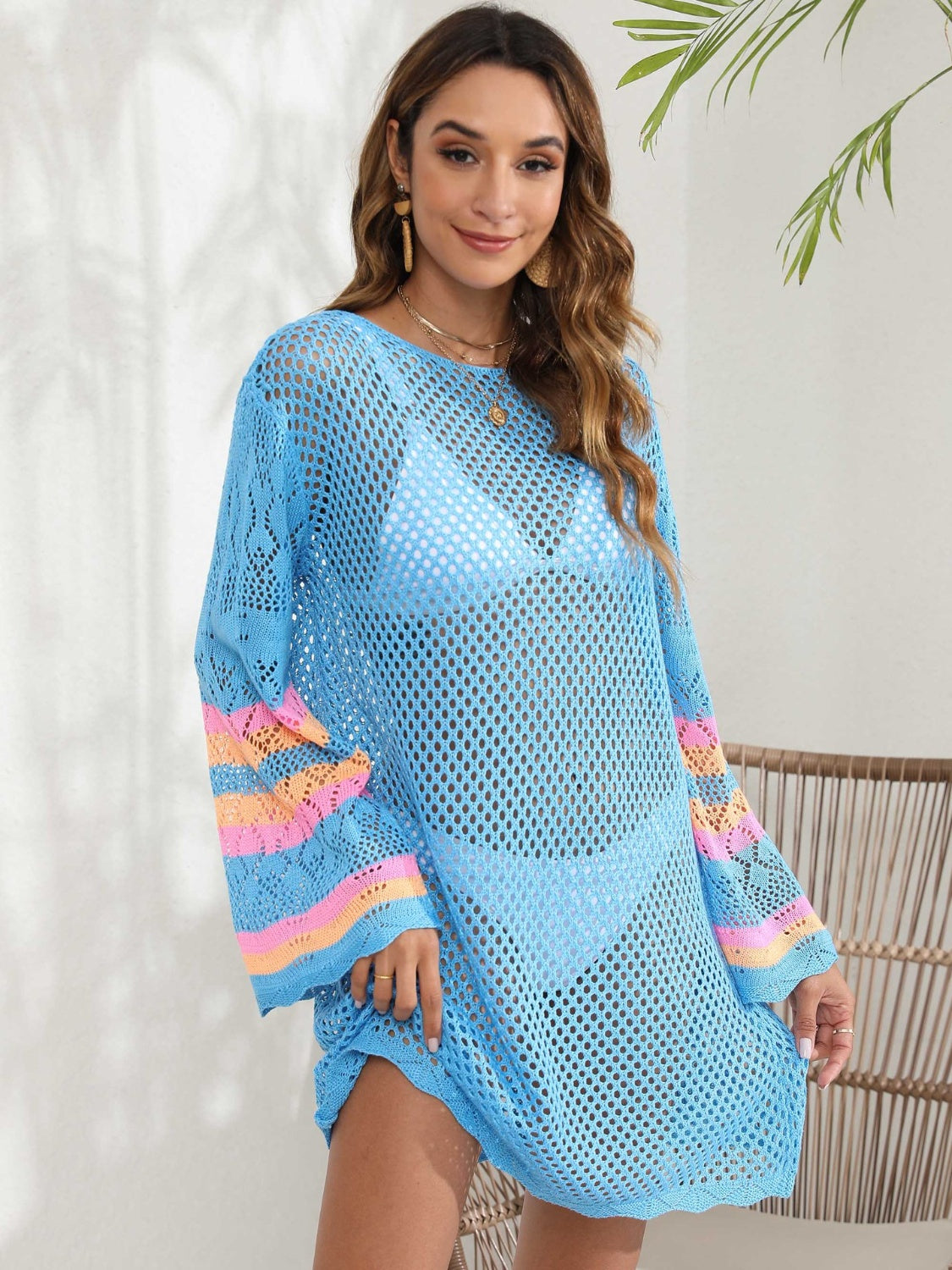 Light blue crochet cover-up with striped bell sleeves and a relaxed fit.