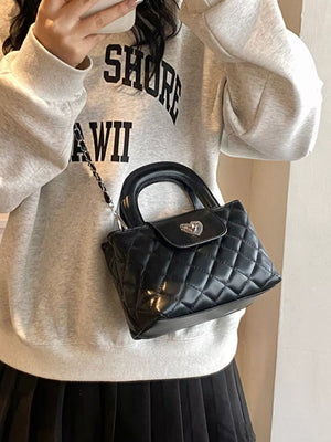 Quilted Heart Lock Crossbody Bag in Black, product detail