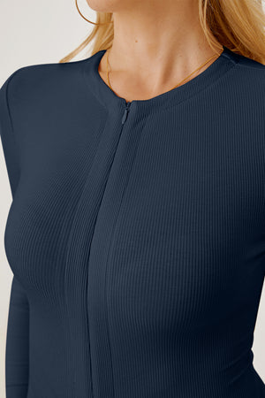 Dark blue ribbed bodysuit with long sleeves and a zip-front neckline.
