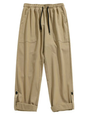 Khaki relaxed fit cuffed cargo trousers with drawstring waist and button tab cuffs.