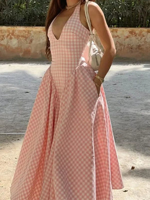 white maxi dress featuring halter neck and gingham