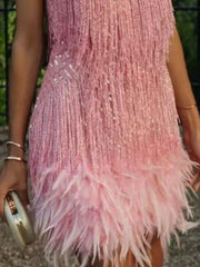 Pink sequin fringe mini dress with feather trim and a clutch bag.