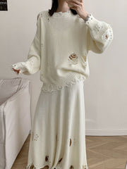 Off white distressed cotton sweater set with deconstructed details and frayed hem