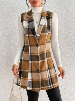 Camel plaid blazer vest with tailored silhouette and button front, worn over a white turtleneck.