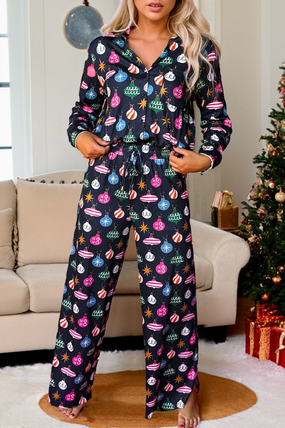 Navy blue loungewear set with festive bauble print, long sleeves, and drawstring pants.