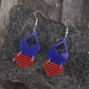 Patriotic bikini acrylic drop earrings in dark blue with red stripes and stars.