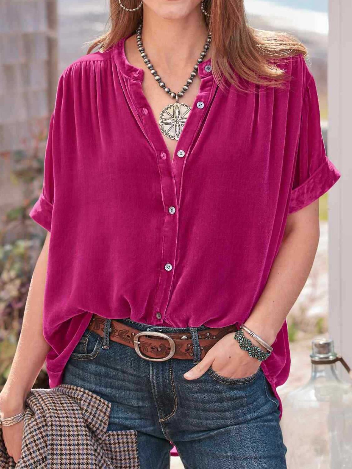 Velvet button-down top in cerise with mandarin collar and short sleeves.