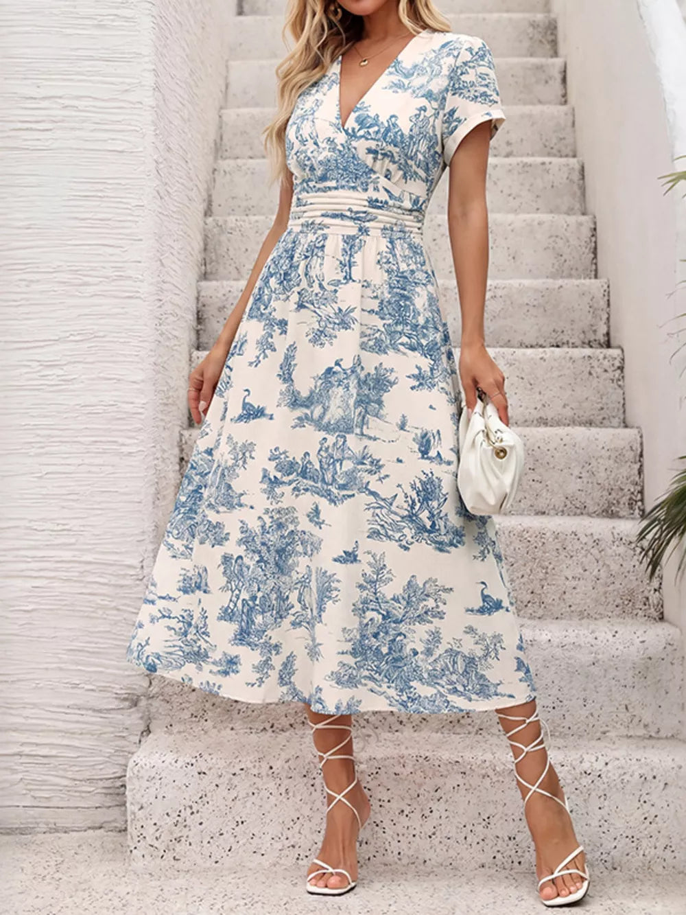 Toile print V-neck midi dress with cinched waist and short sleeves.