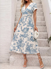 Toile print V-neck midi dress with cinched waist and short sleeves.